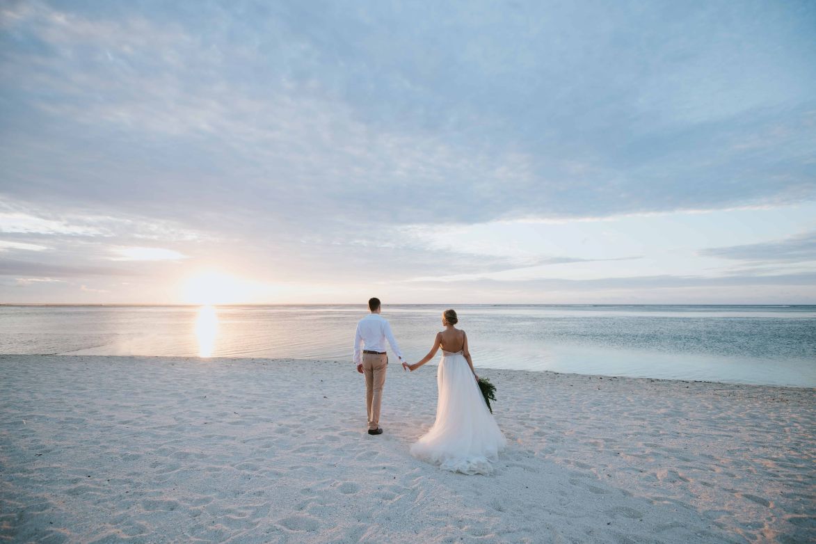 Sunset couple on Anna Maria Island shoreline