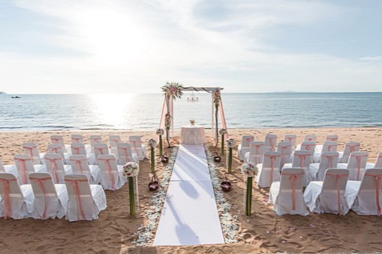 Vows during an intimate beach ceremony on AMI